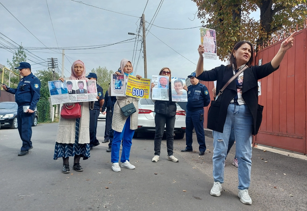 Relatives of imprisoned Kazakhs protest outside the Chinese Consulate.