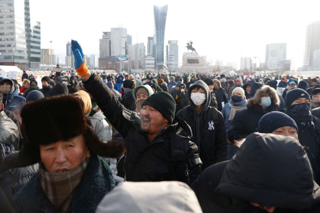 Bundled up against the cold and covid, a large crowd of Mongolians protest government corruption.
