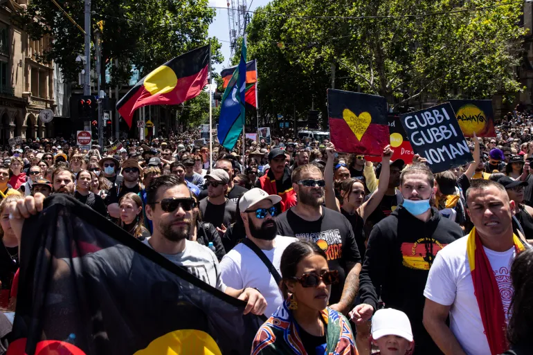 A dense crowd of thousands of First Nations peoples in Australia protest against the annual Invasion Day that commemorates the arrival of Europeans. 
